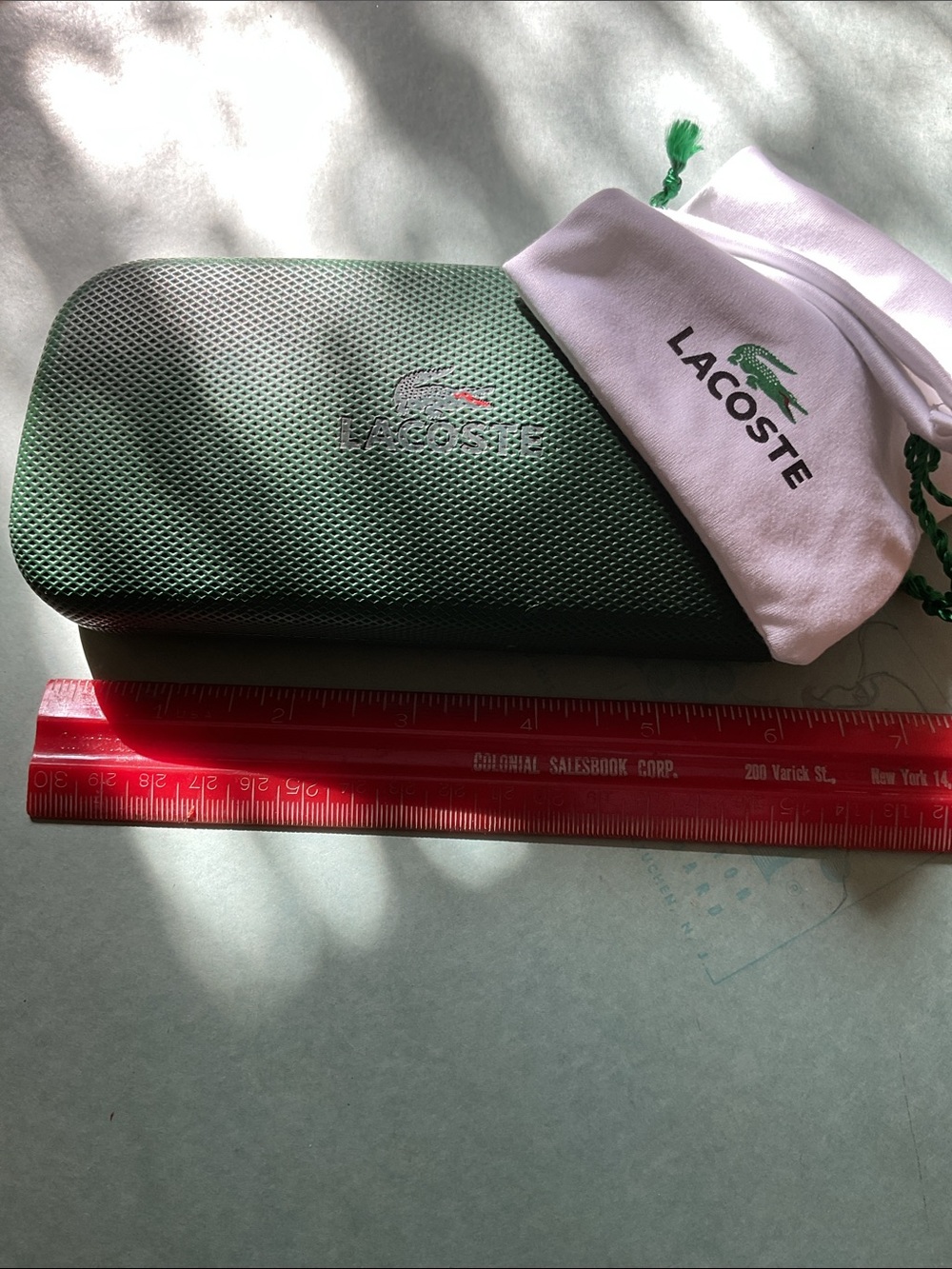 Lacoste hard shell alligator glass case and dust bag